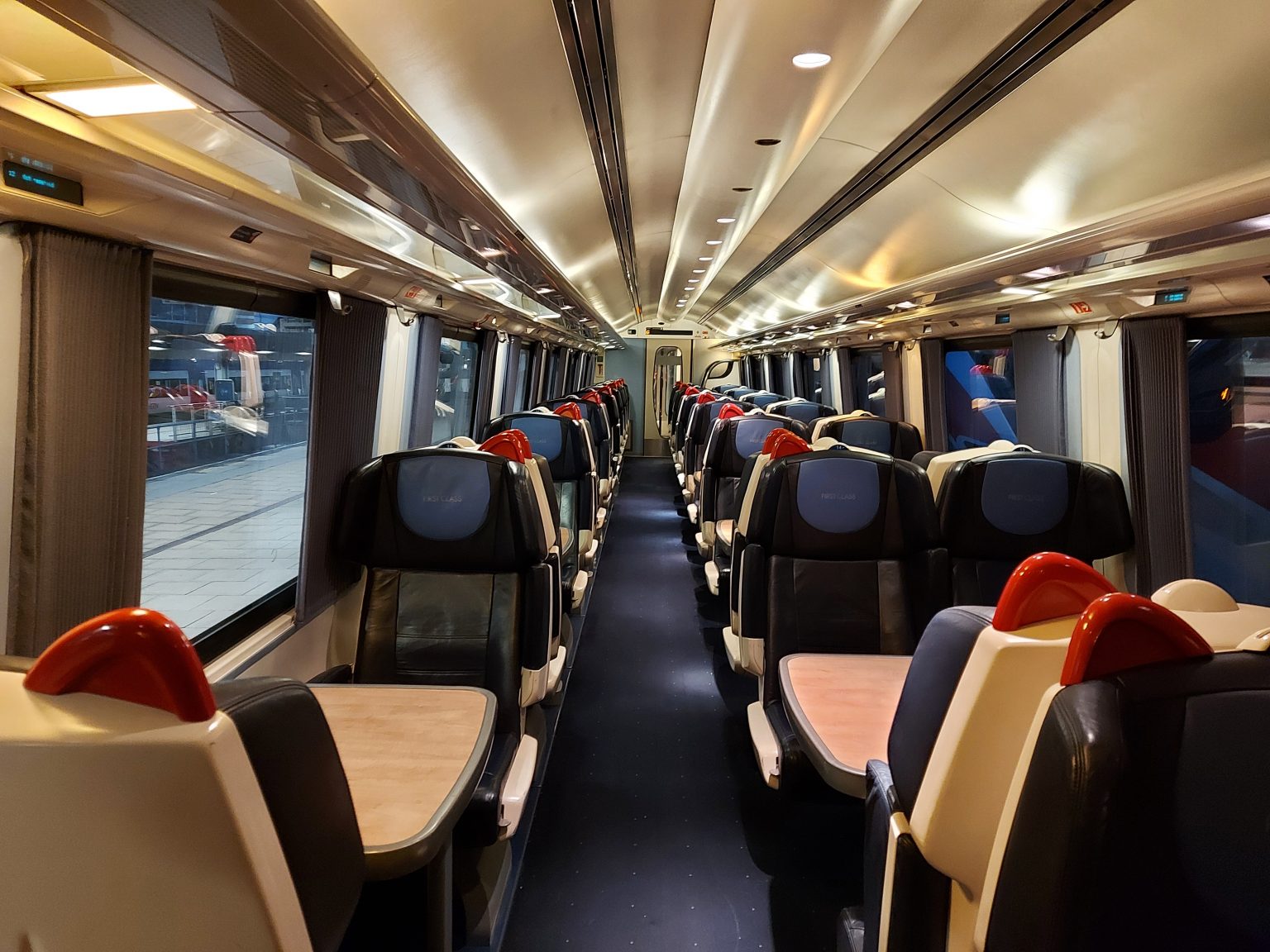 Benefits of First-Class Train Travel: Unlocking Comfort, Privacy, and Convenience