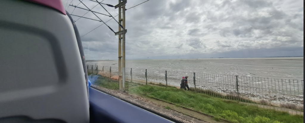view of the thames estuary from a c2c train