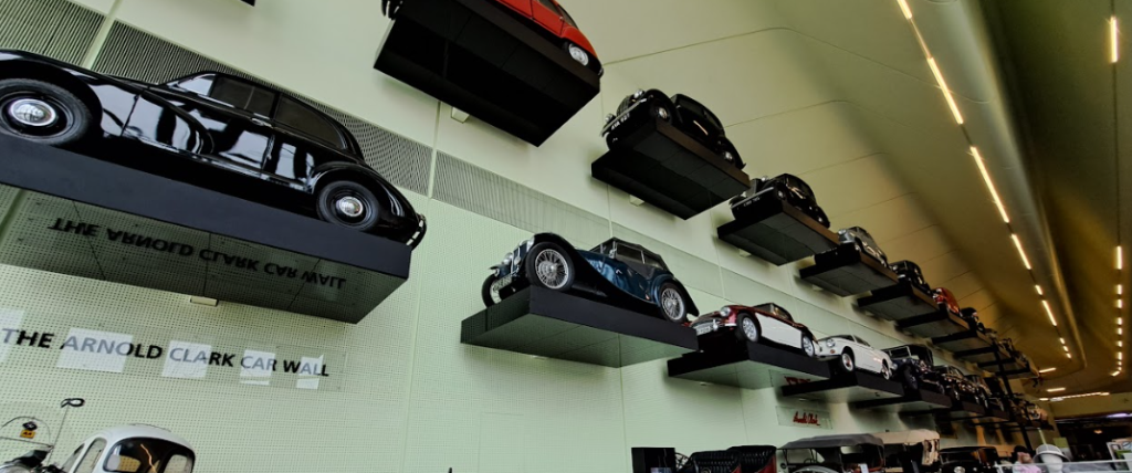 selection of arnold clark cars in the riverside museum, glasgow