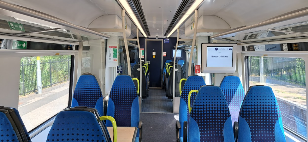interior of a northern train from leeds to manchester