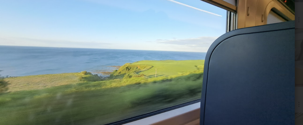 views of the northumberland coast from a lumo train