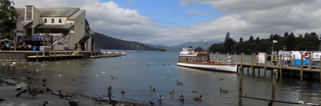 lake windermere in the lake district, which can be accessed by train